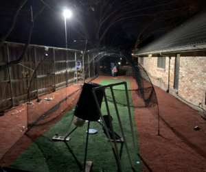 Batting cage with pitching machine and mound. Approx 50’ | Blog.CageList.Com