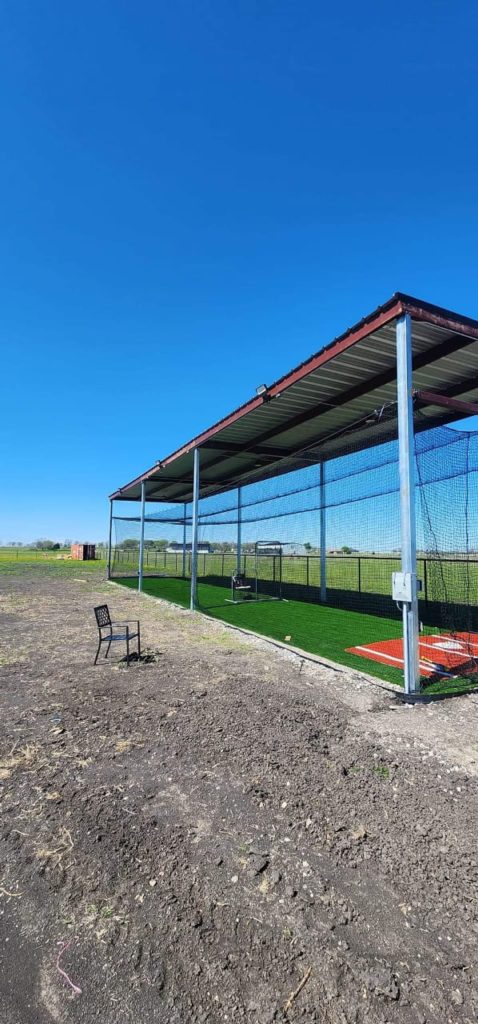 Batting cage in under hot sun