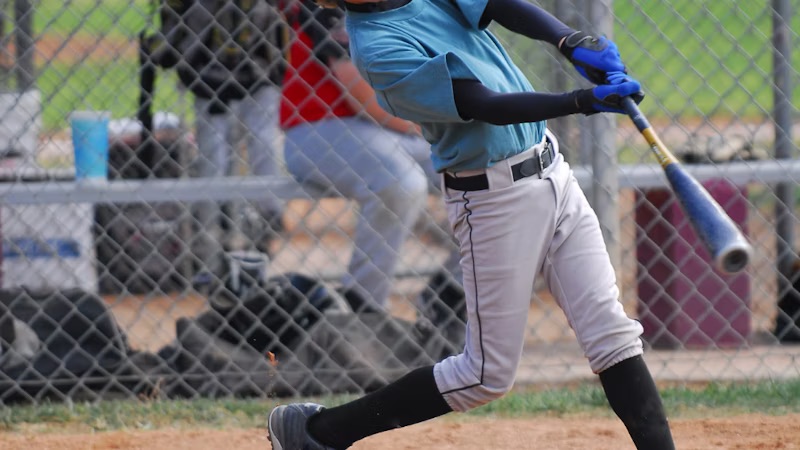 Youth players using batting cages